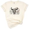 Cowboy and cowgirl in a rodeo scene with a cow skull and desert accents in retro western style.