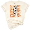 A stacked distressed graphic featuring a soccer ball with a bold lightning bolt accent.