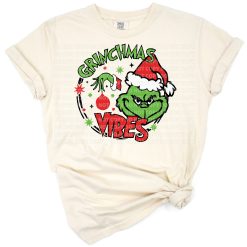 A playful green character with a Christmas theme in a retro holiday design.