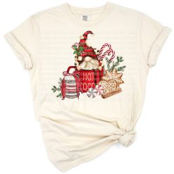 A cheerful gnome with gingerbread cookies and a steaming cup of hot cocoa in a festive Christmas scene.