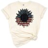 A vibrant sunflower with American flag petals and leopard print accents.