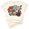 A colorful hippie caravan with guitar, peace symbols, flowers, and mushrooms in a retro style.