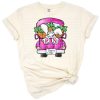 A pink truck filled with an adorable bunny in an Easter-themed setting.