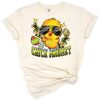 A cartoon-style yellow chick wearing sunglasses with playful lettering and Easter accents.