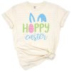 A cheerful cartoon bunny with tall ears surrounded by colorful Easter elements.