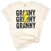 Stacked letters reading granny with a softball and lightning bolt in a distressed style.