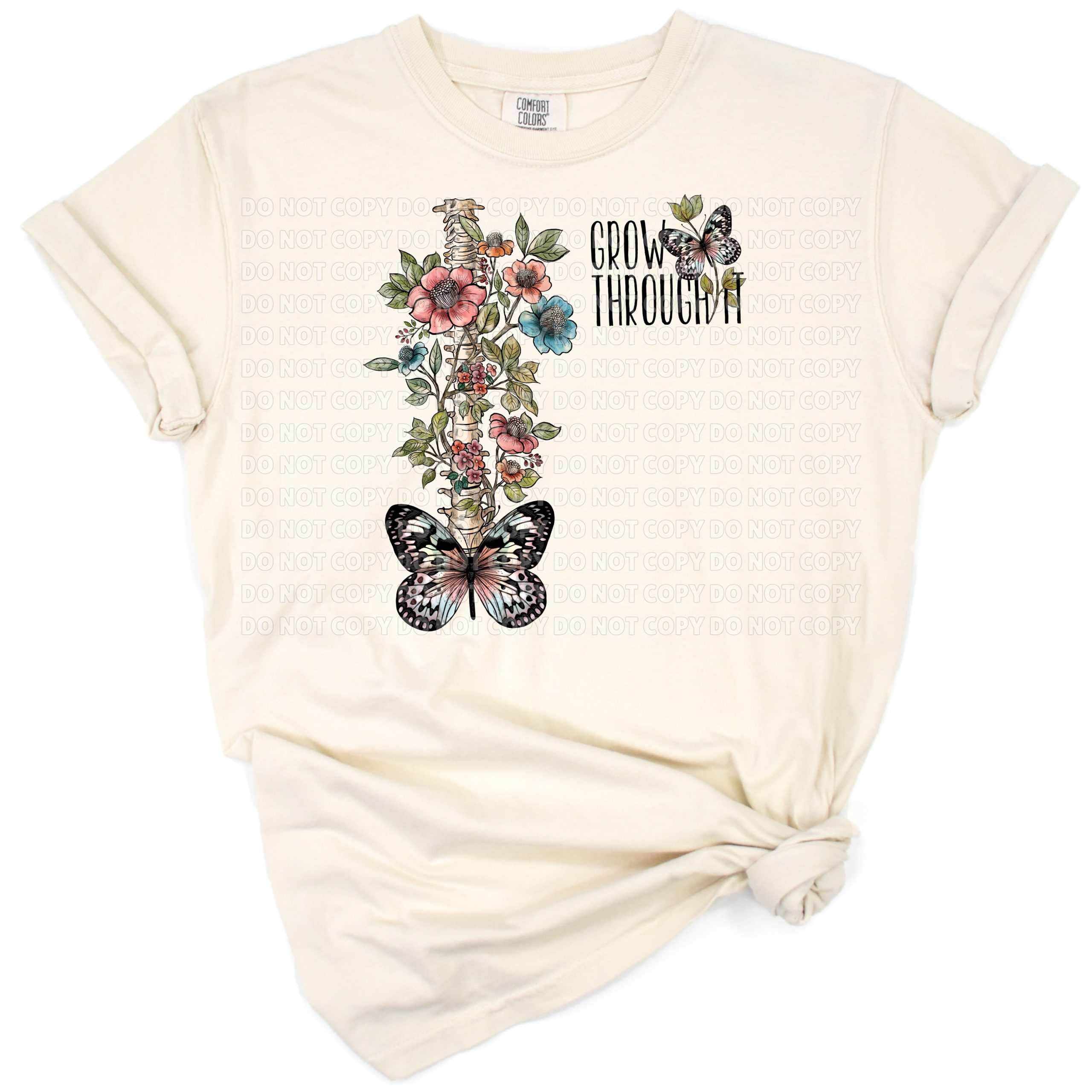 A delicate flower spine with butterflies and skeleton elements, styled with an uplifting phrase.