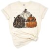 Three cute pumpkins arranged with a playful handwritten mama script and subtle autumn accents.