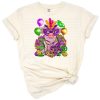 A cute pig wearing Mardi Gras beads in bright purple, green, and gold colors.