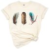 Turquoise and boho floral feather with western style accents.