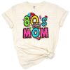 A retro western themed 80's mom with vintage colors and bold graphic accents.