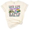 A playful lake life themed design with summer-inspired text and cheerful colors.