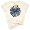 A blue softball with cheetah and leopard print accents in a playful mom life sports design.