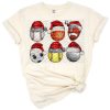 Festive artwork of football and baseball with Christmas decorations.