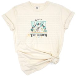 A retro vintage inspired beach scene with text reading I followed my heart and it led me to the beach.