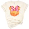 A cute pumpkin with a large bow, styled for autumn and Thanksgiving.