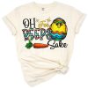 Cute chick with carrots, serape accents, and Easter eggs in a colorful spring design.