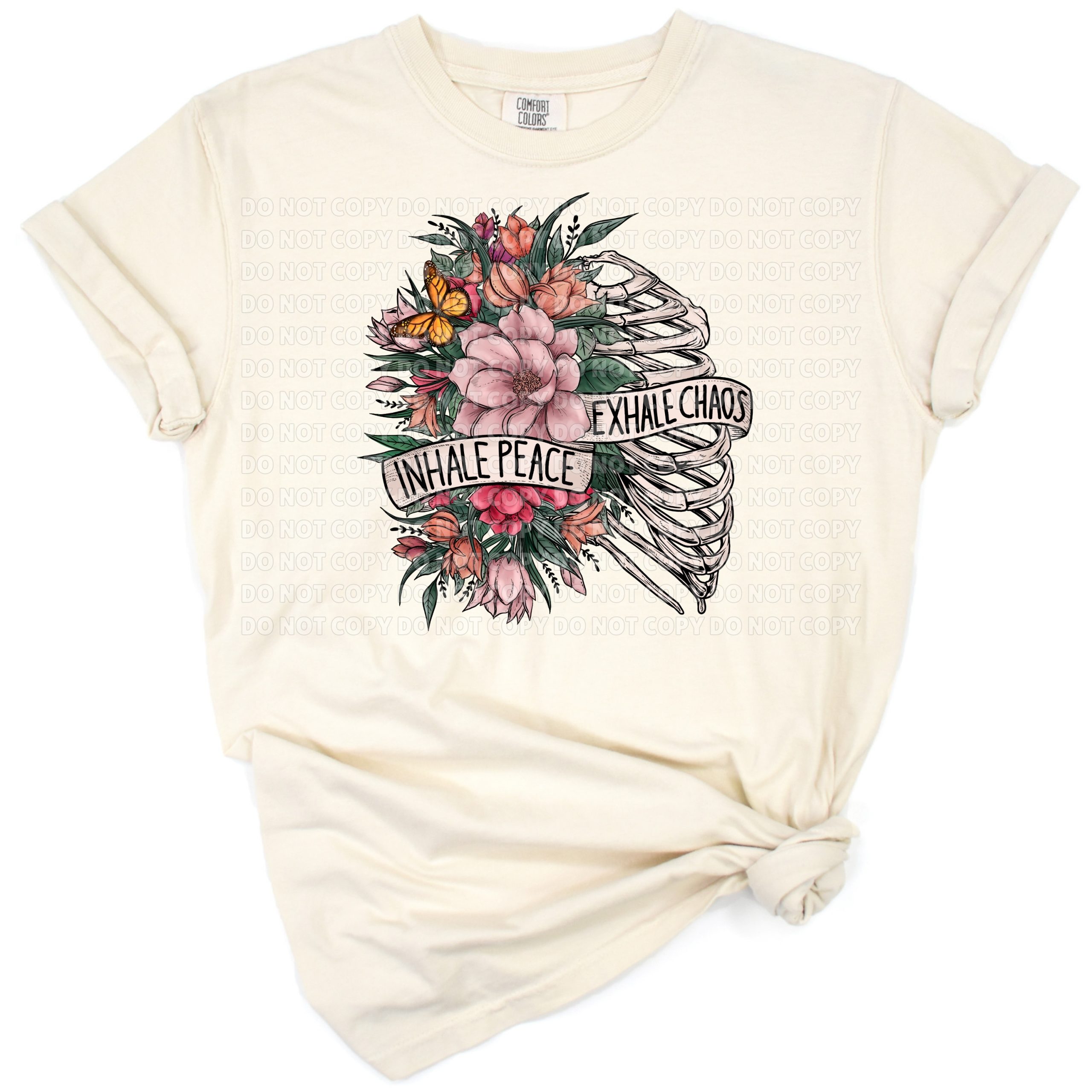 A flower-adorned skull with butterflies and a motivational message in a retro boho style.