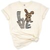 A leopard print Easter bunny holding a cheetah pattern heart illustration.