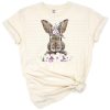 A portrait of a bunny with purple floral accents in a springtime style.