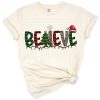 Festive holiday lettering that reads Believe with Christmas accents.