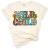 A playful wild child design with turquoise and cowhide elements in a country western style.