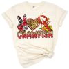 A stylized western crawfish with country and rustic decorative elements.