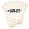 Illustration of the word blessed in turquoise with a leopard and arrow design in western style.
