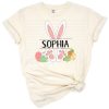 A cute illustration of an Easter bunny with sibling accents, perfect for kids' Easter outfits.