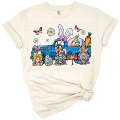 Adorable gnome and Easter bunny riding in a decorated truck with colorful spring accents.