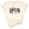 Leopard print letters spelling love with a heart and cheerleading elements