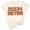 Basketball themed numbers with sports elements arranged for a birthday celebration design.