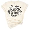 A cheerful hand-lettered Hello Spring quote with colorful flowers and leafy accents.