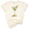 A western-style martini glass with an olive and playful country flair.
