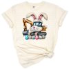 A cute cartoon excavator driven by a bunny with Easter eggs scattered around.