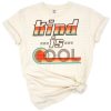 A cheerful retro rainbow with the phrase 'Kind Is Cool' in vintage lettering.
