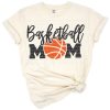 A sporty design featuring the word mom with a basketball and stylish elements.