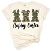 Three cartoon bunnies in army green camouflage sitting in a row