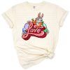 A cheerful Easter gnome holding a carrot surrounded by cute bunnies and love motifs.