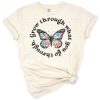 A retro boho butterfly illustration with flowers and the phrase grow through what you go through.