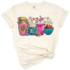 A retro style coffee mug with classroom and teacher themed elements.