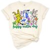 An Easter bunny surrounded by colorful sports balls and festive spring elements.