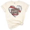 A distressed red heart with baseball stitching in a grunge style.
