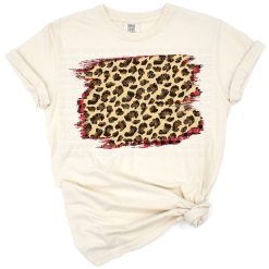 A distressed leopard animal print with red buffalo plaid splash background design.