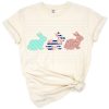 Three bunnies in pale teal and navy stripes with blush floral and rose glitter accents for Easter and spring.