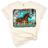 A western style horse with turquoise and cowhide accents and a decorative background.