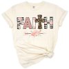 A blush pink floral and leopard stripe cross with rose glitter and arrow accents in a Christian Easter theme.