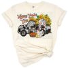 A vintage truck filled with flowers and a bunny, celebrating Easter in a playful spring scene.