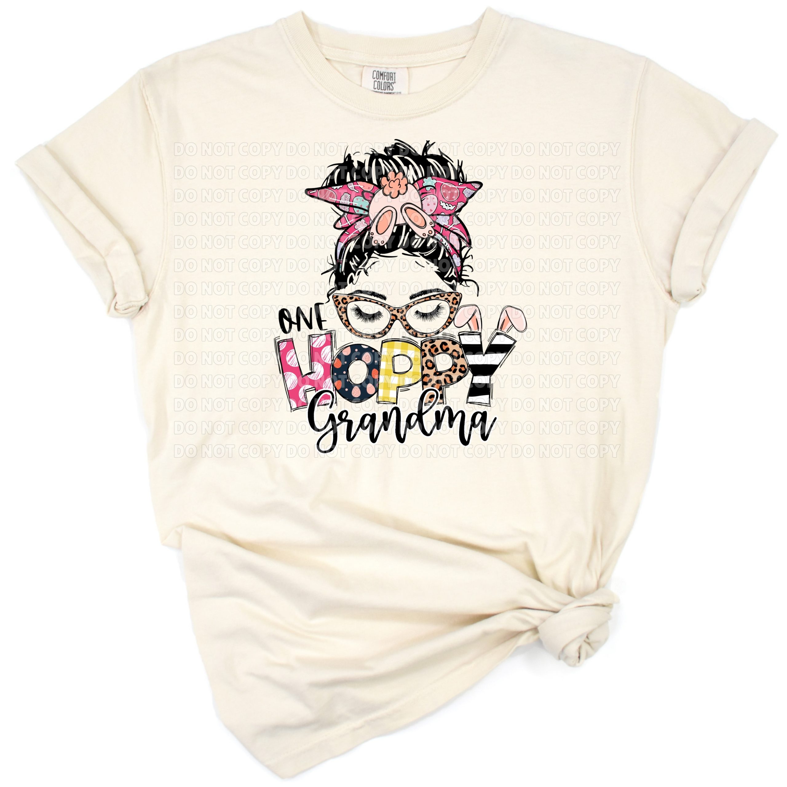 A cheerful cartoon bunny with spring flowers and the words 'One Hoppy Grandma' in playful lettering.