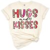 A playful design featuring hugs and kisses XOXO text with heart accents in a fun, festive style.